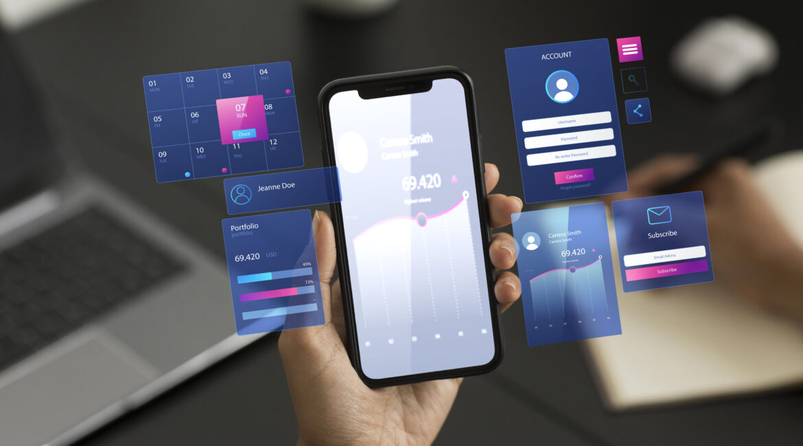 Uma mão segurando um smartphone que está ampliando imagens de calendário, gráficos e contas